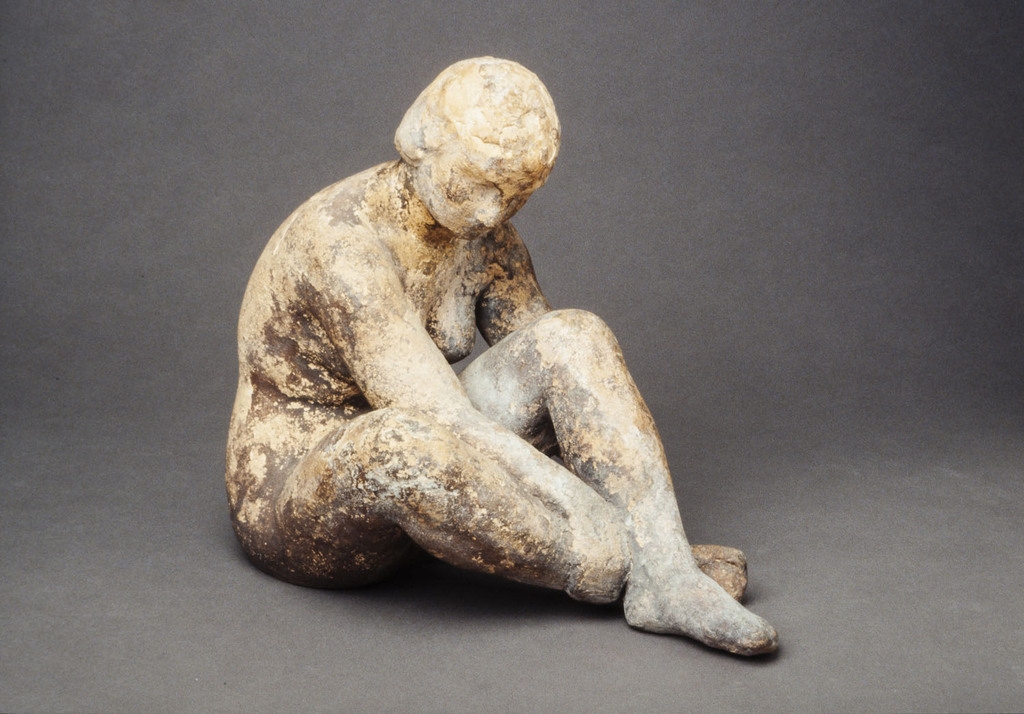 Figure accroupie