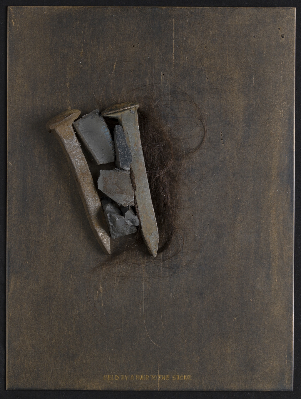 Held by a Hair to the Stone